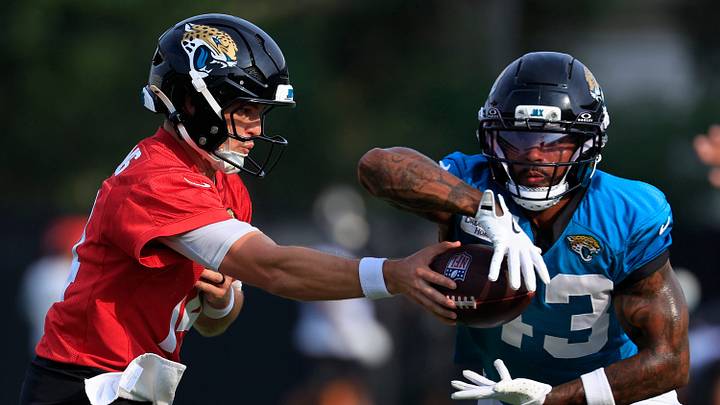 Jacksonville Jaguars quarterback Nick Mullens (14) hands off to running back Ameer Abdullah (43) during the third day of NFL Training Camp at the Miller Electric Center on Friday, July 31, 2026, in Jacksonville, Fla. Jacksonville Jaguars quarterback Nick Mullens (14) hands off to running back Ameer Abdullah (43) during the third day of NFL Training Camp at the Miller Electric Center on Friday, July 31, 2026, in Jacksonville, Fla.
