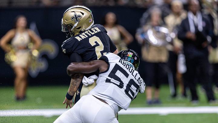Aug 15, 2026; New Orleans, Louisiana, USA; New Orleans Saints quarterback Spencer Rattler (2) scrambles from the pocket and fumbles the ball against Jacksonville Jaguars linebacker Yasir Abdullah (56) during the first half at Caesars Superdome. Mandatory Credit: Stephen Lew-Imagn Images Aug 15, 2026; New Orleans, Louisiana, USA; New Orleans Saints quarterback Spencer Rattler (2) scrambles from the pocket and fumbles the ball against Jacksonville Jaguars linebacker Yasir Abdullah (56) during the first half at Caesars Superdome. Mandatory Credit: Stephen Lew-Imagn Images