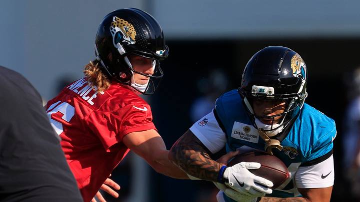 Jacksonville Jaguars quarterback Trevor Lawrence (16) hands off to running back Christian Rodriguez Jr. (24) during Day 15 of NFL training camp at the Miller Electric Center on Tuesday, Aug. 18, 2026, in Jacksonville, Fla. Jacksonville Jaguars quarterback Trevor Lawrence (16) hands off to running back Christian Rodriguez Jr. (24) during Day 15 of NFL training camp at the Miller Electric Center on Tuesday, Aug. 18, 2026, in Jacksonville, Fla.