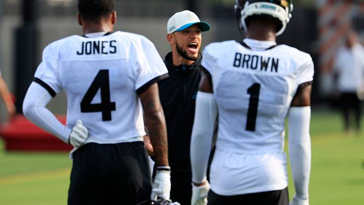 Jacksonville Jaguars defensive pass game coordinator Mathieu Araujo instructs near cornerback Jarrian Jones (4) and cornerback Montaric Brown (1) during the third day of NFL Training Camp at the Miller Electric Center on Friday, July 31, 2026, in Jacksonville, Fla. Jacksonville Jaguars defensive pass game coordinator Mathieu Araujo instructs near cornerback Jarrian Jones (4) and cornerback Montaric Brown (1) during the third day of NFL Training Camp at the Miller Electric Center on Friday, July 31, 2026, in Jacksonville, Fla.