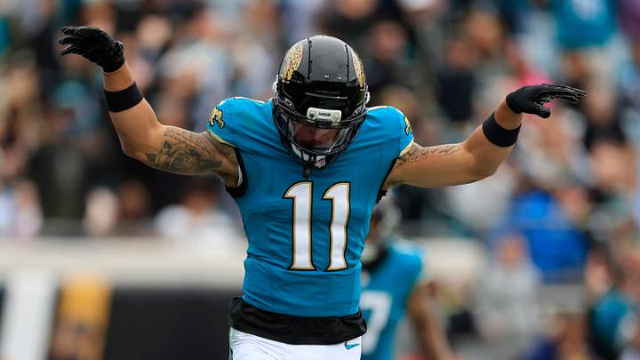 Jacksonville Jaguars wide receiver Parker Washington (11) scores a touchdown during the first quarter of an NFL football matchup at EverBank Stadium, Sunday, Jan. 4, 2026, in Jacksonville, Fla. [Corey Perrine/Florida Times-Union]