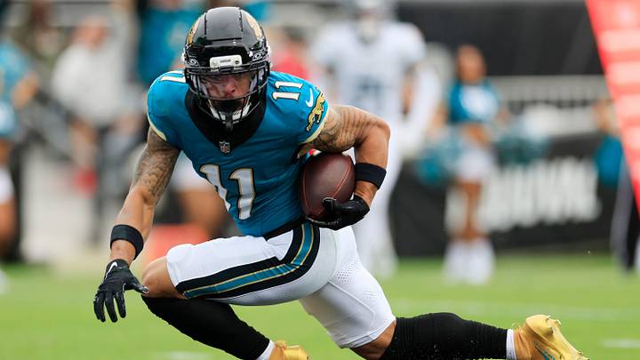Jacksonville Jaguars wide receiver Parker Washington (11) scores a touchdown during the first quarter of an NFL football matchup at EverBank Stadium, Sunday, Jan. 4, 2026, in Jacksonville, Fla. [Corey Perrine/Florida Times-Union]