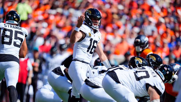 Sep 20, 2026; Denver, Colorado, USA; Jacksonville Jaguars quarterback Trevor Lawrence (16) calls a play at the line of scrimmage against the Denver Broncos during the first quarter at Empower Field at Mile High. Mandatory Credit: Ron Chenoy-Imagn Images Sep 20, 2026; Denver, Colorado, USA; Jacksonville Jaguars quarterback Trevor Lawrence (16) calls a play at the line of scrimmage against the Denver Broncos during the first quarter at Empower Field at Mile High. Mandatory Credit: Ron Chenoy-Imagn Images