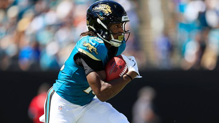 Jacksonville Jaguars wide receiver Josh Cameron (19) runs the ball out on the opening kickoff during the first quarter of an NFL football matchup at EverBank Stadium on Sunday, Sept. 27, 2026, in Jacksonville, Fla. The Jaguars defeated the Patriots 35-6. [Corey Perrine/Florida Times‑Union]
