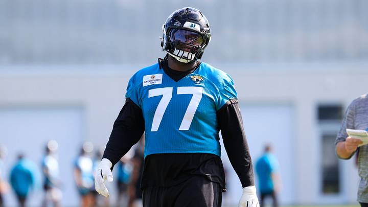 Jacksonville Jaguars offensive tackle Anton Harrison (77) looks on during the third day of minicamp at the Miller Electric Center, Thursday, June 11, 2026, in Jacksonville, Fla.anto