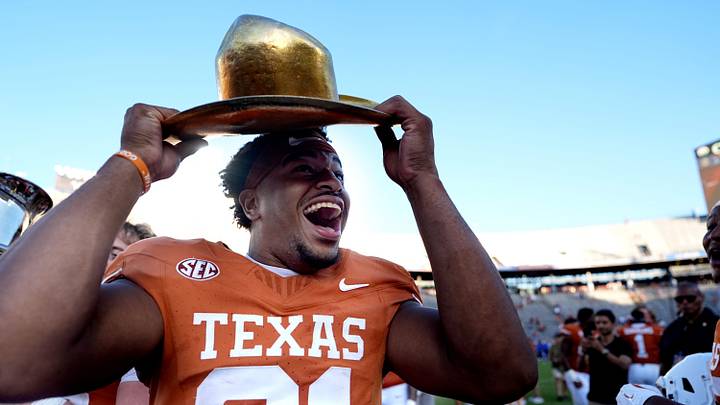 Texas Longhorns tight end Nick Townsend (81) celebrates with the golden hat in the second half of the Red River Rivalry college football game. Texas Longhorns tight end Nick Townsend (81) celebrates with the golden hat in the second half of the Red River Rivalry college football game.