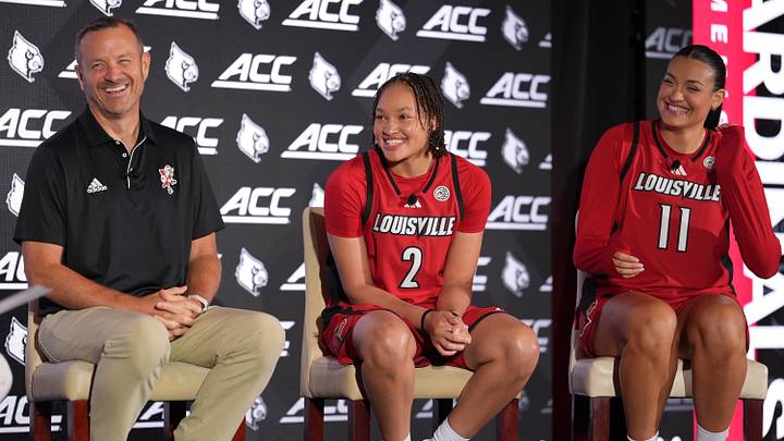 Oct 6, 2026; Charlotte, NC, USA; Louisville Cardinals head coach Jeff Walz, Imari Berry and Elif Istanbulluoglu answer questions from the media during the ACC Basketball Tip-Off in Charlotte, NC. Mandatory Credit: Jim Dedmon-Imagn Images Oct 6, 2026; Charlotte, NC, USA; Louisville Cardinals head coach Jeff Walz, Imari Berry and Elif Istanbulluoglu answer questions from the media during the ACC Basketball Tip-Off in Charlotte, NC. Mandatory Credit: Jim Dedmon-Imagn Images