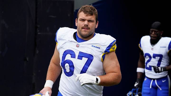 Sep 29, 2024; Chicago, Illinois, USA; Los Angeles Rams guard Justin Dedich (67) in a game against the Chicago Bears at Soldier Field. Mandatory Credit: David Banks-Imagn Images Sep 29, 2024; Chicago, Illinois, USA; Los Angeles Rams guard Justin Dedich (67) in a game against the Chicago Bears at Soldier Field. Mandatory Credit: David Banks-Imagn Images