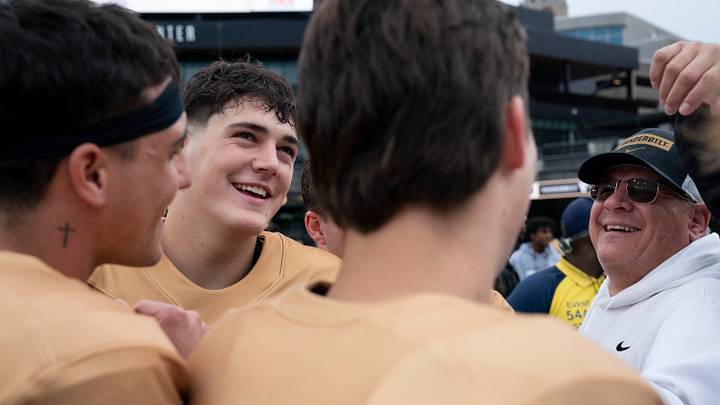 Vanderbilt quarterback Jared Curtis (2), left, and offensive coordinator Tim Beck and the other quarterbacks gather after Vanderbilt Football's Black and Gold Spring Game in FirstBank Stadium at Vanderbilt University Saturday, April 18, 2026. Vanderbilt quarterback Jared Curtis (2), left, and offensive coordinator Tim Beck and the other quarterbacks gather after Vanderbilt Football's Black and Gold Spring Game in FirstBank Stadium at Vanderbilt University Saturday, April 18, 2026.