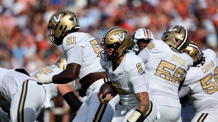 Sep 26, 2026; Auburn, Alabama, USA;  Vanderbilt Commodores quarterback Jared Curtis (2) runs against the Auburn Tigers during the second half Jordan-Hare Stadium.  The kick was good.  Mandatory Credit: John Reed-Imagn Images
