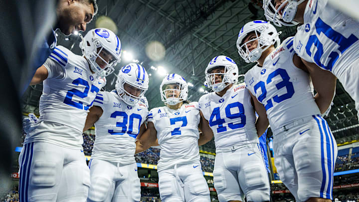 BYU running backs warm up for the Alamo Bowl against Colorado BYU running backs warm up for the Alamo Bowl against Colorado