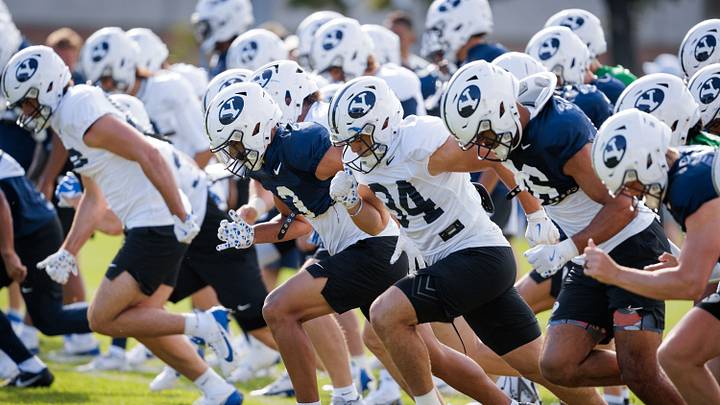 BYU football team warms up for Fall Camp BYU football team warms up for Fall Camp