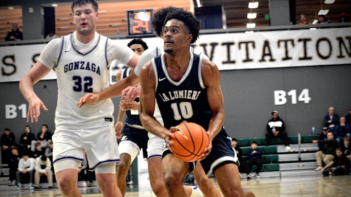 La Lumiere's Jalen Haralson drives against Gonzaga College in the Les Schwab Invitational championship in Portland, Oregon. 