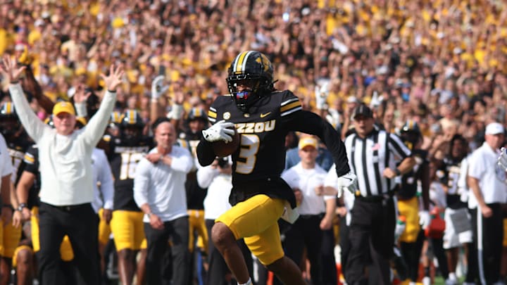 Sep 6, 2025; Columbia, Missouri, USA; Missouri Tigers wide receiver Kevin Coleman (3) catches the ball and runs it to the 2-yard line against the Kansas Jayhawks in the first quarter of the Border War at Faurot Field at Memorial Stadium. Sep 6, 2025; Columbia, Missouri, USA; Missouri Tigers wide receiver Kevin Coleman (3) catches the ball and runs it to the 2-yard line against the Kansas Jayhawks in the first quarter of the Border War at Faurot Field at Memorial Stadium.