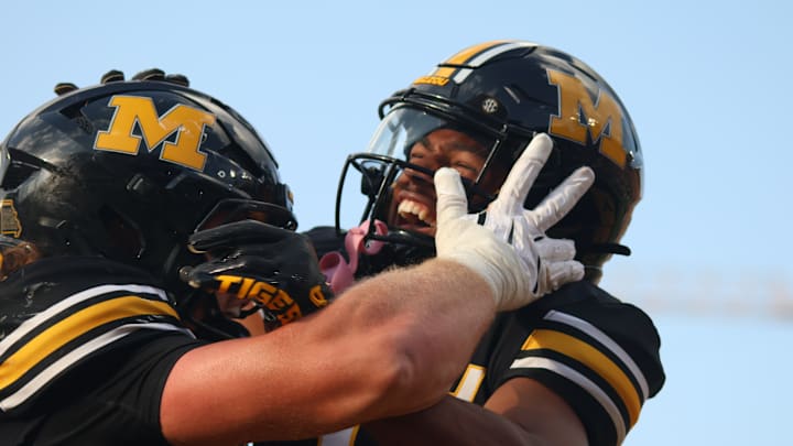 Sep 6, 2025; Columbia, Missouri, USA; Missouri Tigers wide receiver Donovan Olugbode (1) celebrates tight end Brett Norfleet's (87) touchdown in the second half of the Border War at Faurot Field at Memorial Stadium.