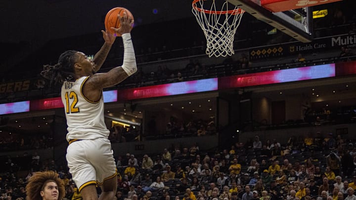 Nov 9, 2025; Columbia, Missouri, USA; Missouri Tigers guard Sebastian Mack (12) jumps for a shot against the VMI Keydets at Mizzou Arena.
