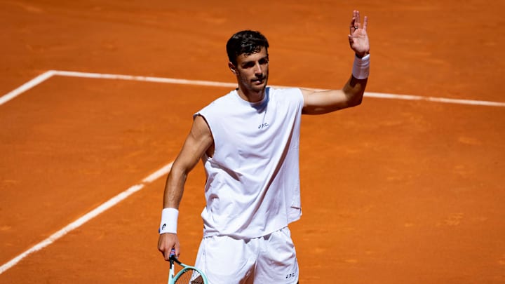 Lorenzo Musetti celebrates his victory over Tomas Etcheverry at the 2025 Mutua Madrid Open. Lorenzo Musetti celebrates his victory over Tomas Etcheverry at the 2025 Mutua Madrid Open.
