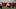 Wisconsin OL Coach Eric Mateos runs through a drill with OT Kevin Heywood. Wisconsin OL Coach Eric Mateos runs through a drill with OT Kevin Heywood.