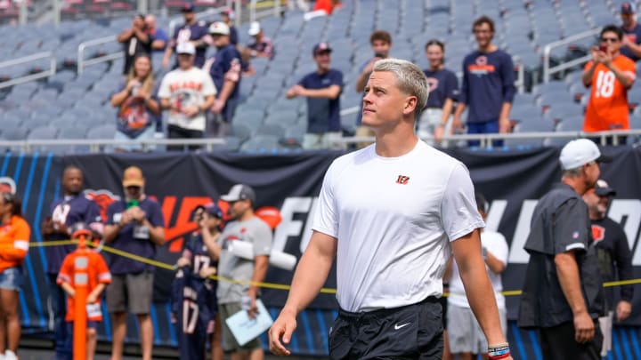 Cincinnati Bengals quarterback Joe Burrow (9) walks the field during warmups before the NFL Preseason Week 2 game between the Chicago Bears and the Cincinnati Bengals at Soldier Field in downtown Chicago on Saturday, Aug. 17, 2024. Cincinnati Bengals quarterback Joe Burrow (9) walks the field during warmups before the NFL Preseason Week 2 game between the Chicago Bears and the Cincinnati Bengals at Soldier Field in downtown Chicago on Saturday, Aug. 17, 2024.