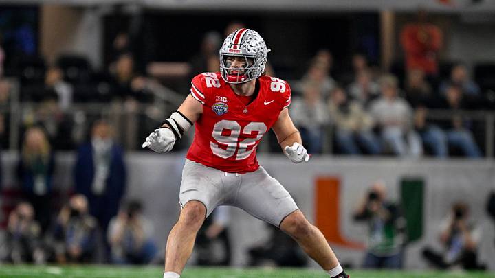 Dec 31, 2025; Arlington, TX, USA; Ohio State Buckeyes defensive end Caden Curry (92) rushes the line during the 2025 Cotton Bowl and quarterfinal game of the College Football Playoff at AT&T Stadium. Mandatory Credit: Jerome Miron-Imagn Images Dec 31, 2025; Arlington, TX, USA; Ohio State Buckeyes defensive end Caden Curry (92) rushes the line during the 2025 Cotton Bowl and quarterfinal game of the College Football Playoff at AT&T Stadium. Mandatory Credit: Jerome Miron-Imagn Images