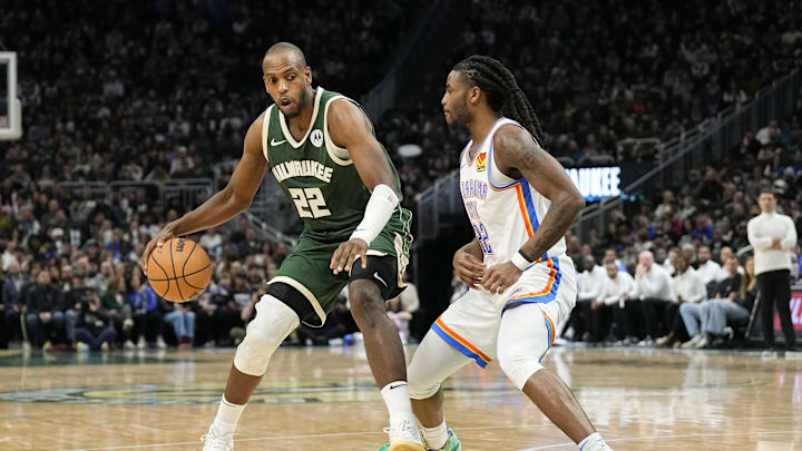 Mar 24, 2024; Milwaukee, Wisconsin, USA; Milwaukee Bucks forward Khris Middleton (22) dribbles the ball as Oklahoma City Thunder guard Cason Wallace (22) defends during the fourth quarter at Fiserv Forum. Mandatory Credit: Jeff Hanisch-Imagn Images Mar 24, 2024; Milwaukee, Wisconsin, USA; Milwaukee Bucks forward Khris Middleton (22) dribbles the ball as Oklahoma City Thunder guard Cason Wallace (22) defends during the fourth quarter at Fiserv Forum. Mandatory Credit: Jeff Hanisch-Imagn Images