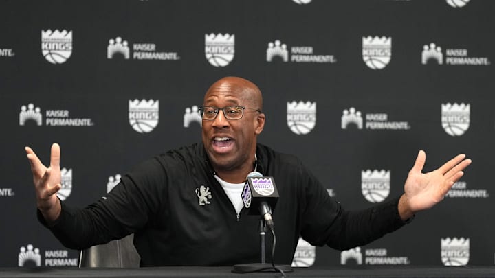 Dec 8, 2024; Sacramento, California, USA; Sacramento Kings head coach Mike Brown talks to media members before the game against the Utah Jazz at Golden 1 Center. Mandatory Credit: Darren Yamashita-Imagn Images
