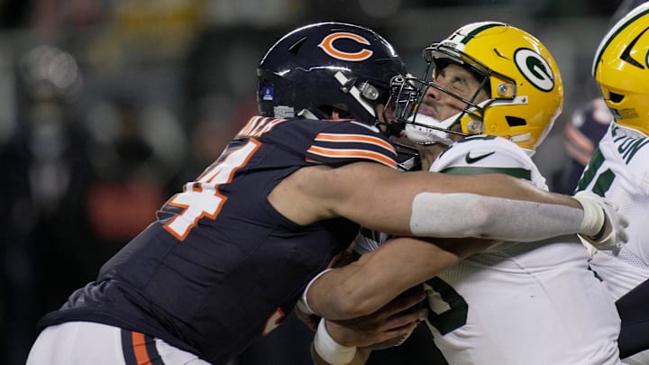 Green Bay Packers quarterback Jordan Love (10) is sacked by Chicago Bears defensive end Austin Booker (94) and suffers a concussion during the second quarter of their game Saturday, December 20, 2025 at Soldier Field in Chicago, Illinois.