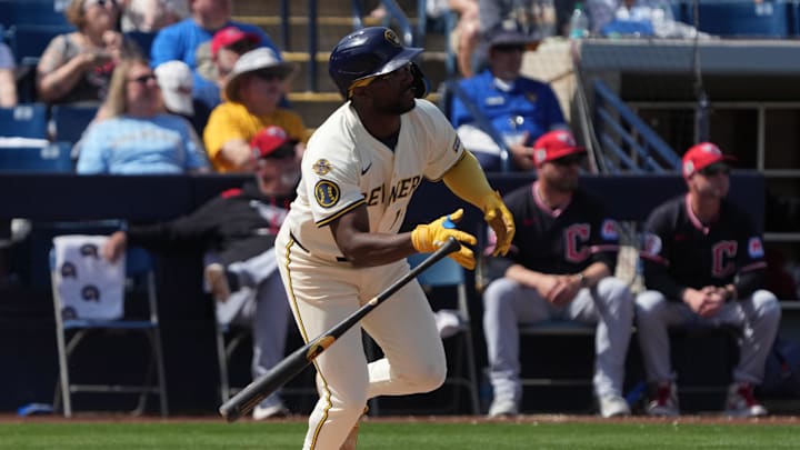 Milwaukee Brewers third baseman Andruw Monasterio (14) hits a single against the Cleveland Guardians in the third inning at American Family Fields of Phoenix on March 16, 2025. Milwaukee Brewers third baseman Andruw Monasterio (14) hits a single against the Cleveland Guardians in the third inning at American Family Fields of Phoenix on March 16, 2025.