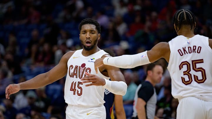 Cleveland Cavaliers guard Donovan Mitchell (45) celebrates with Cleveland Cavaliers forward Isaac Okoro (35) during the fourth quarter at Smoothie King Center. Cleveland Cavaliers guard Donovan Mitchell (45) celebrates with Cleveland Cavaliers forward Isaac Okoro (35) during the fourth quarter at Smoothie King Center.