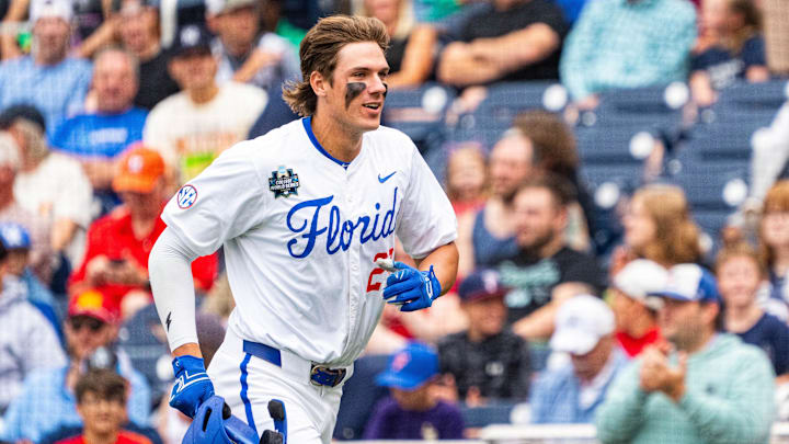Jun 19, 2024; Omaha, NE, USA; Florida Gators designated hitter Brody Donay (29) runs off the field after hitting a grand slam against the Kentucky Wildcats during the first inning at Charles Schwab Field Omaha. Mandatory Credit: Dylan Widger-Imagn Images