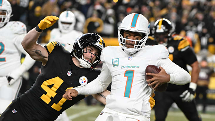 Pittsburgh Steelers linebacker Payton Wilson (41) sacks Miami Dolphins quarterback Tua Tagovailoa (1) in the third quarter at Acrisure Stadium. 