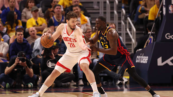 Apr 28, 2025; San Francisco, California, USA; Houston Rockets center Alperen Sengun (28) controls the ball against Golden State Warriors forward Draymond Green (23) during the second quarter of game four of the 2025 NBA Playoffs first round at Chase Center. Mandatory Credit: Kelley L Cox-Imagn Images Apr 28, 2025; San Francisco, California, USA; Houston Rockets center Alperen Sengun (28) controls the ball against Golden State Warriors forward Draymond Green (23) during the second quarter of game four of the 2025 NBA Playoffs first round at Chase Center. Mandatory Credit: Kelley L Cox-Imagn Images