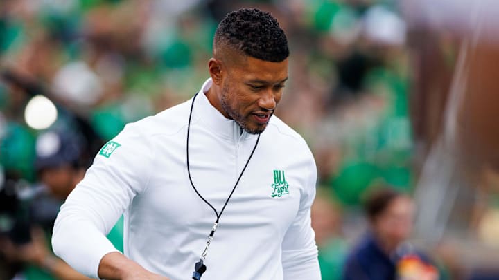 Notre Dame head coach Marcus Freeman greets his players before a NCAA college football game between Notre Dame and Louisville at Notre Dame Stadium on Saturday, Sept. 28, 2024, in South Bend.