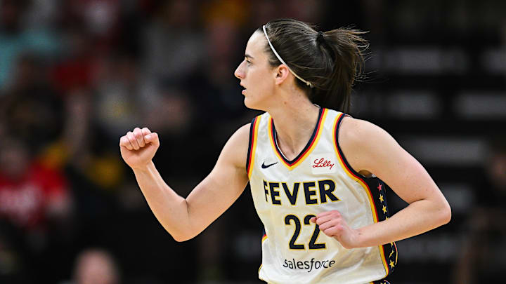 Indiana Fever guard Caitlin Clark (22) reacts during the first quarter against the Brazil National Team at Carver-Haweye Arena. 