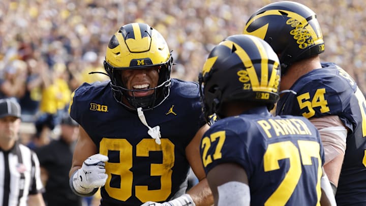 Oct 18, 2025; Ann Arbor, Michigan, USA; Michigan Wolverines tight end Zack Marshall (83) celebrates with teammates after scoring a touchdown in the second half against the Washington Huskies at Michigan Stadium. Mandatory Credit: Rick Osentoski-Imagn Images Oct 18, 2025; Ann Arbor, Michigan, USA; Michigan Wolverines tight end Zack Marshall (83) celebrates with teammates after scoring a touchdown in the second half against the Washington Huskies at Michigan Stadium. Mandatory Credit: Rick Osentoski-Imagn Images