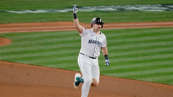 Oct 17, 2025; Seattle, Washington, USA; Seattle Mariners catcher Cal Raleigh (29) rounds the bases after hitting a solo home run against the Toronto Blue Jays in the eighth inning during game five of the ALCS round for the 2025 MLB playoffs at T-Mobile Park. Mandatory Credit: John Froschauer-Imagn Images