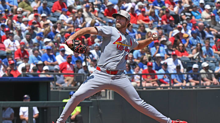 May 18, 2025; Kansas City, Missouri, USA;  St. Louis Cardinals starting pitcher Matthew Liberatore (52) throws a pitch in the first inning against the Kansas City Royals at Kauffman Stadium. Mandatory Credit: Peter Aiken-Imagn Images