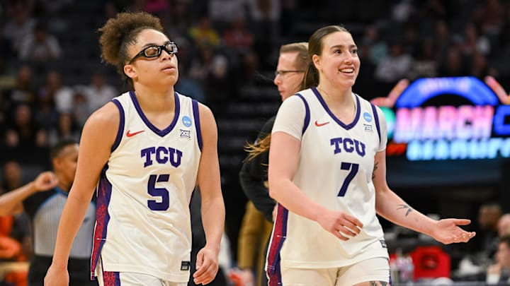 Mar 28, 2026; Sacramento, CA, USA; Texas Christian University Horned Frogs guard Olivia Miles (5) and forward Marta Suarez (7) walk off the court during a time out in the game against the Virginia Cavaliers in the Sweet Sixteen game of the Sacramento Regional 4 of the women's 2026 NCAA Tournament at Golden 1 Center. Mandatory Credit: Ed Szczepanski-Imagn Images