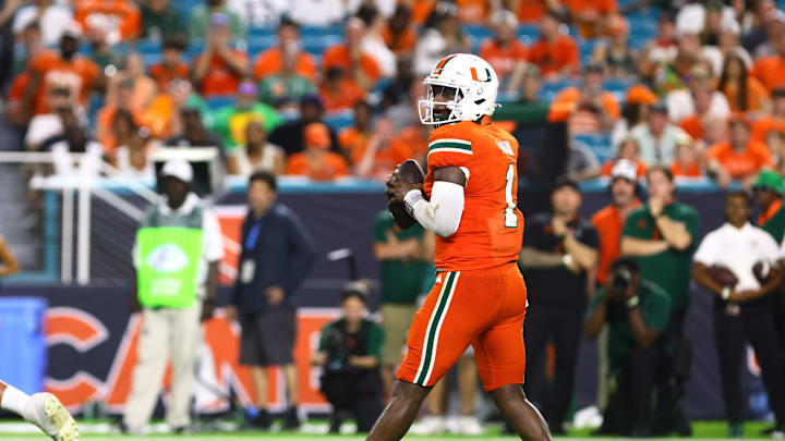 Sep 7, 2024; Miami Gardens, Florida, USA; Miami Hurricanes quarterback Cam Ward (1) drops back to pass against the Florida A&M Rattlers during the third quarter at Hard Rock Stadium. Mandatory Credit: Sam Navarro-Imagn Images Sep 7, 2024; Miami Gardens, Florida, USA; Miami Hurricanes quarterback Cam Ward (1) drops back to pass against the Florida A&M Rattlers during the third quarter at Hard Rock Stadium. Mandatory Credit: Sam Navarro-Imagn Images