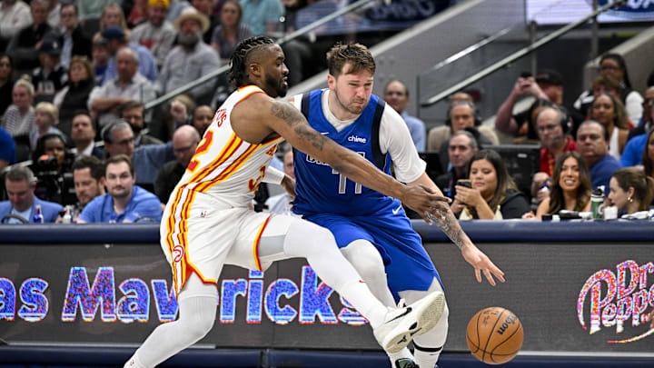 Apr 4, 2024; Dallas, Texas, USA; Atlanta Hawks guard Wesley Matthews (32) knocks the ball away from
