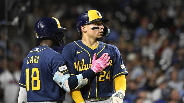 Sep 1, 2026; Chicago, Illinois, USA; Milwaukee Brewers right fielder Luis Lara (18) pats catcher William Contreras (24) on the chest after he scores during the sixth inning against the Chicago Cubs at Wrigley Field. Mandatory Credit: Matt Marton-Imagn Images Sep 1, 2026; Chicago, Illinois, USA; Milwaukee Brewers right fielder Luis Lara (18) pats catcher William Contreras (24) on the chest after he scores during the sixth inning against the Chicago Cubs at Wrigley Field. Mandatory Credit: Matt Marton-Imagn Images