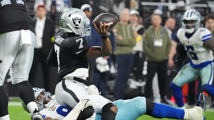 Nov 17, 2025; Paradise, Nevada, USA; Dallas Cowboys defensive tackle Osa Odighizuwa (97) pressures Las Vegas Raiders quarterback Geno Smith (7) during the second half at Allegiant Stadium. Mandatory Credit: Kirby Lee-Imagn Images