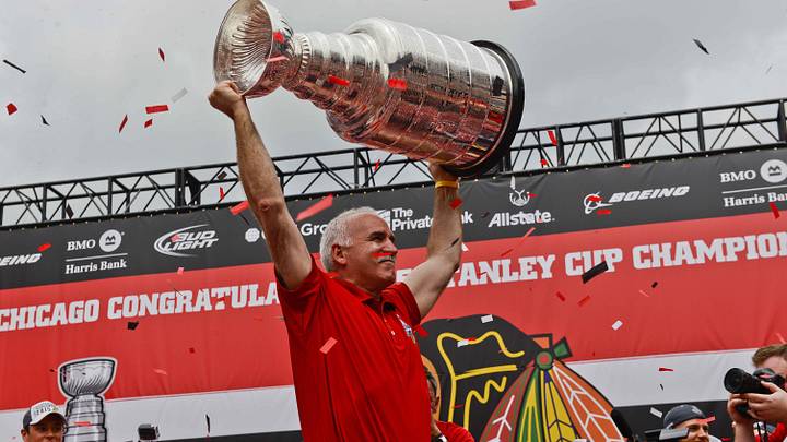 Jun 18, 2015; Chicago, IL, USA; Chicago Blackhawks head coach Joel Quenneville holds the Stanley Cup during the 2015 Stanley Cup championship rally at Soldier Field. Mandatory Credit: Matt Marton-USA TODAY Sports