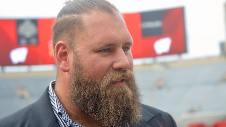Former Badgers lineman Travis Frederick speaks with reporters inside Camp Randall Stadium after being announced as a class of 2025 inductee for the UW Athletic Hall of Fame on May 29, 2025.