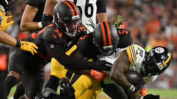 Oct 1, 2026; Cleveland, Ohio, USA;  Pittsburgh Steelers running back Jaylen Warren (30) rushes the ball against Cleveland Browns linebacker Quincy Williams (5) at Huntington Bank Field.  Mandatory Credit: Ken Blaze-Imagn Images