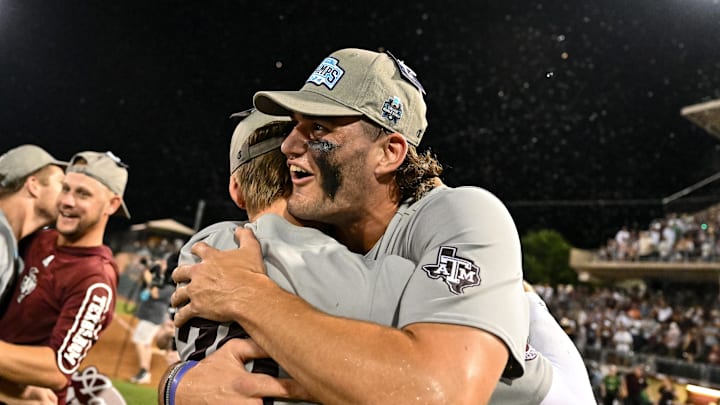 Jun 9, 2024; College Station, TX, USA; Texas A&M celebrates after sweeping Oregon in the Bryan-College Station Super Regional series at Olsen Field, Blue Bell Park Mandatory Credit: Maria Lysaker-Imagn Images
