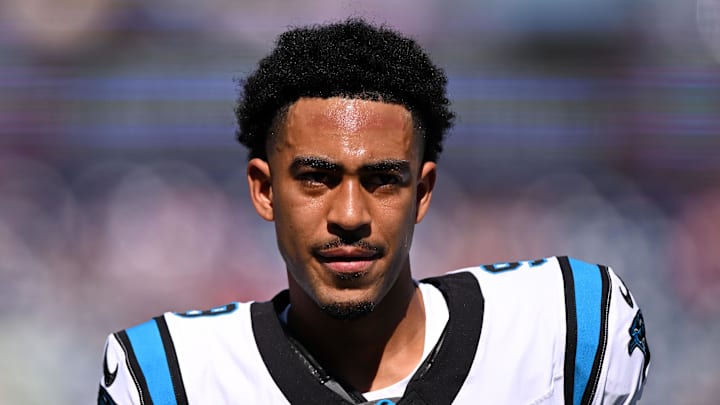Carolina Panthers quarterback Bryce Young (9) runs off of the field during warmups before a game against the New England Patriots at Gillette Stadium. Carolina Panthers quarterback Bryce Young (9) runs off of the field during warmups before a game against the New England Patriots at Gillette Stadium.