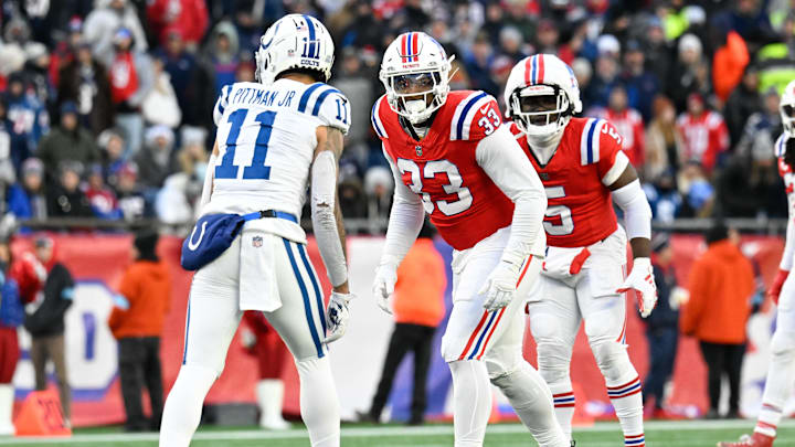 Dec 1, 2024; Foxborough, Massachusetts, USA; New England Patriots linebacker Anfernee Jennings (33) lines up against Indianapolis Colts wide receiver Michael Pittman Jr. (11) during the second half at Gillette Stadium. Mandatory Credit: Eric Canha-Imagn Images