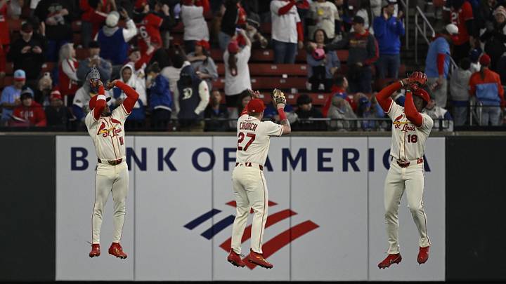 May 2, 2026; St. Louis, Missouri, USA; St. Louis Cardinals center fielder Victor Scott II (11), St. Louis Cardinals left fielder Nathan Church (27) and St. Louis Cardinals right fielder Jordan Walker (18) celebrate after beating the Los Angeles Dodgers at Busch Stadium. Mandatory Credit: Joe Puetz-Imagn Images