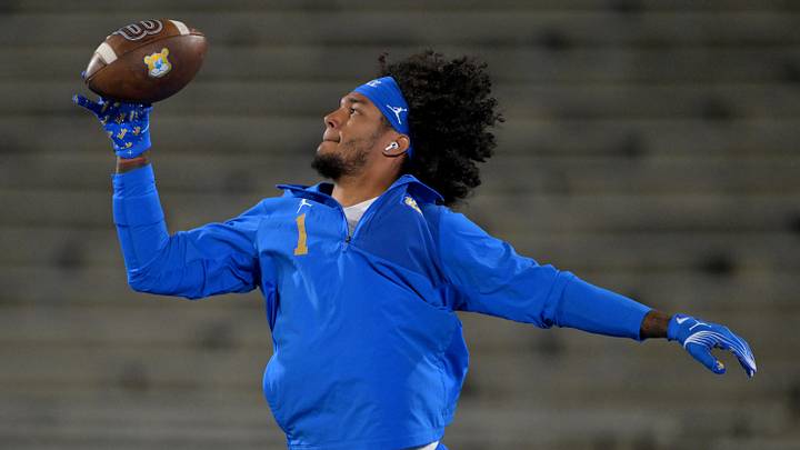 Nov 22, 2025; Pasadena, California, USA; UCLA Bruins wide receiver Rico Flores Jr. (1) warms up prior to the game against the Washington Huskies at Rose Bowl. Mandatory Credit: Jayne Kamin-Oncea-Imagn Images Nov 22, 2025; Pasadena, California, USA; UCLA Bruins wide receiver Rico Flores Jr. (1) warms up prior to the game against the Washington Huskies at Rose Bowl. Mandatory Credit: Jayne Kamin-Oncea-Imagn Images
